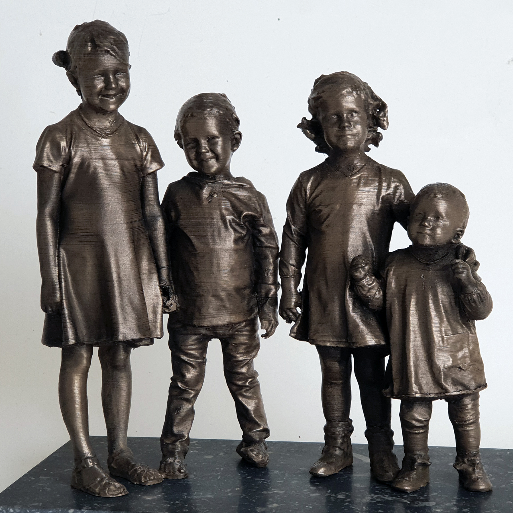Bronzen beeldjes kinderen Bronzen beeldjes kinderen